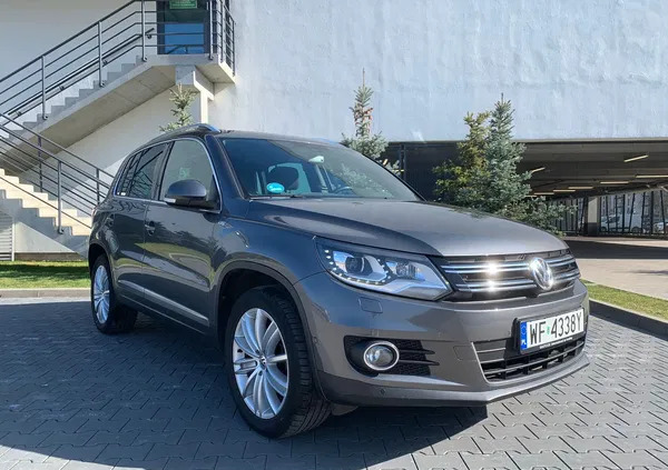 samochody osobowe Volkswagen Tiguan cena 50950 przebieg: 206372, rok produkcji 2014 z Warszawa